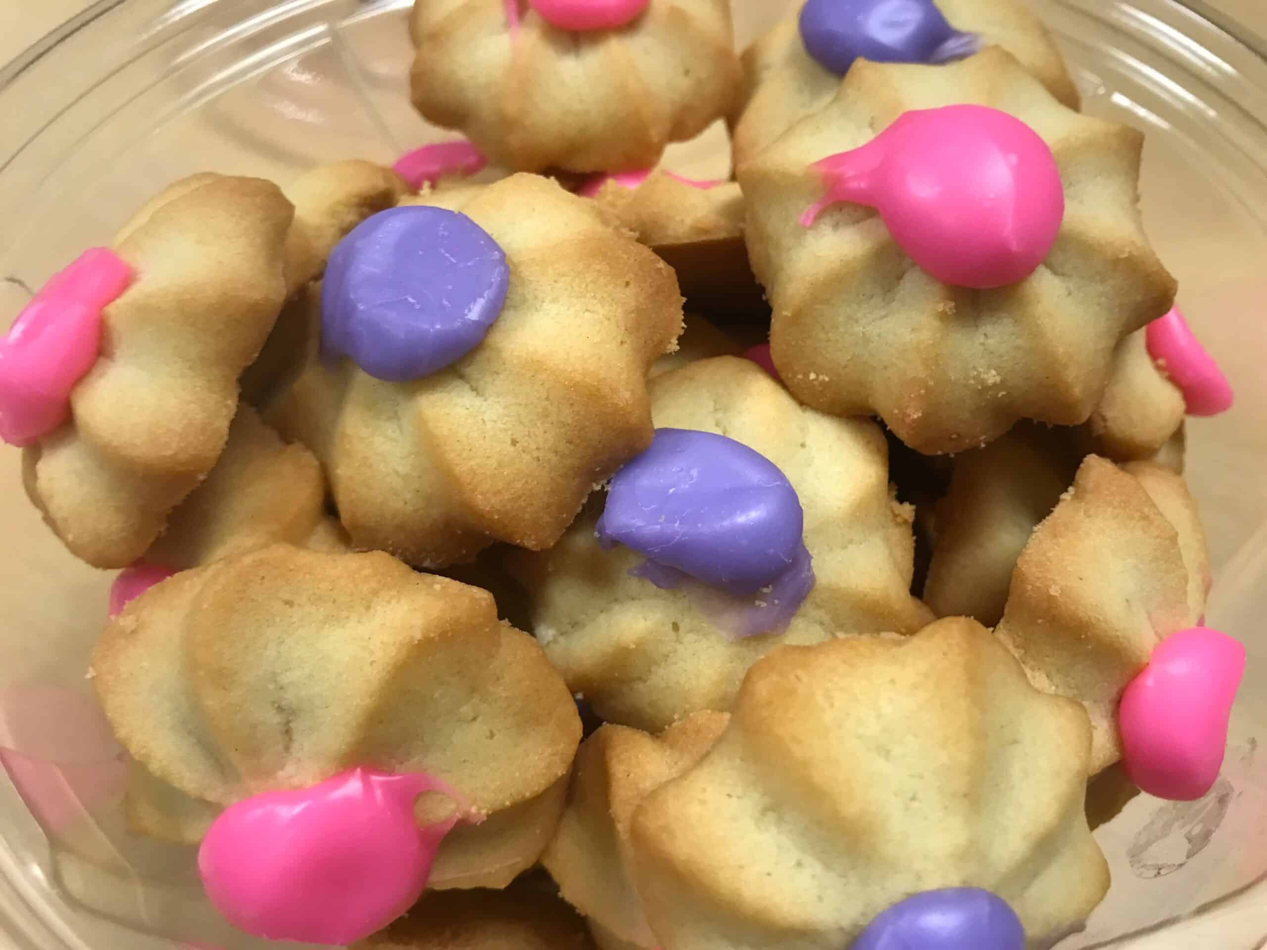 A close up of a bowl of Ukrop's famous Butterstar Cookies.