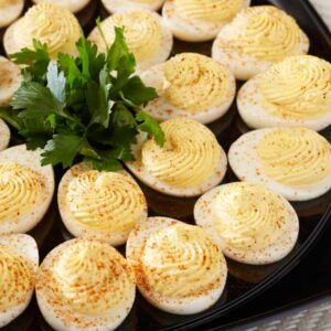 A tray full of deviled eggs.