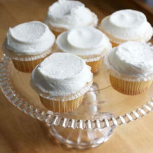 A plate of Ukrop's vanilla cupcakes with buttercream frosting.