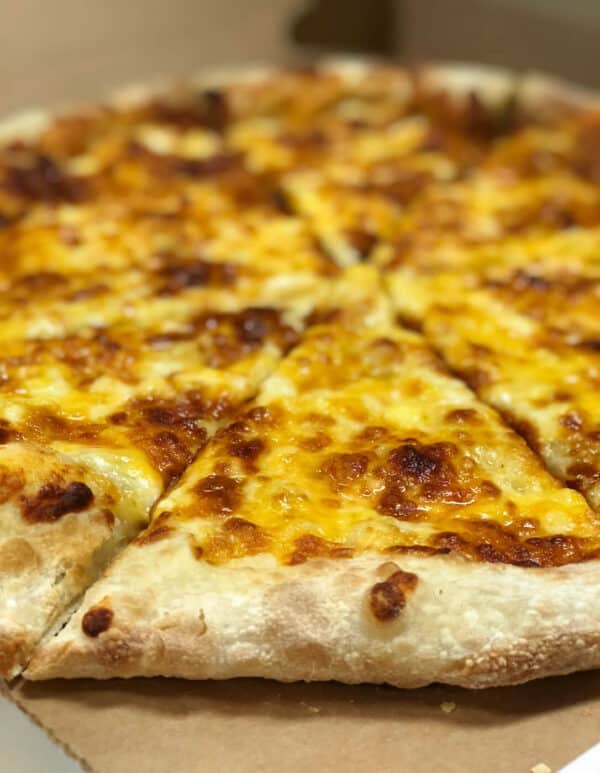 A close up of a Ukrop's Egg and Cheese Pizza.